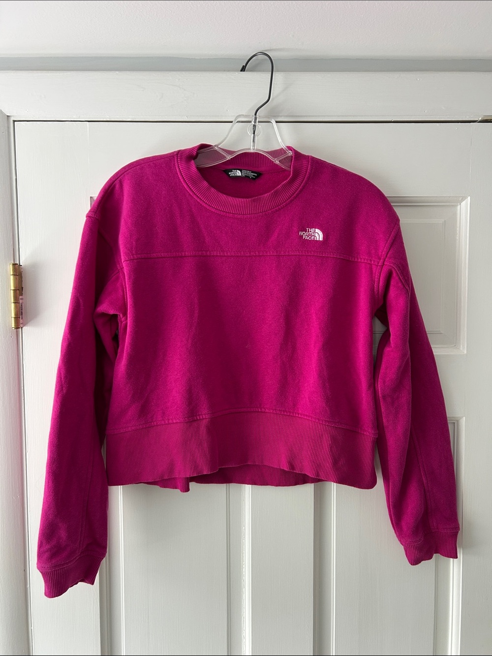 The North Face Girl’s Crew Fleece Sweatshirt in Fuchsia Pink